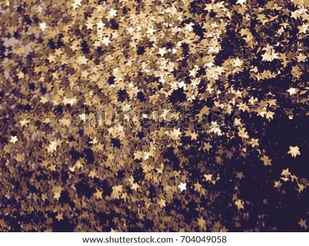 Gold glitter star study (light, shadow, filters, focus, unfocused)