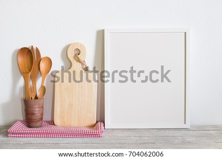 Frame with utensil on table.cooking concept