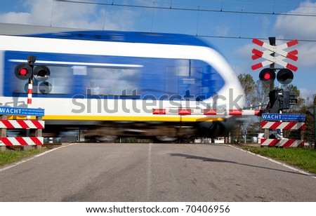 Railroad crossing with high speed train