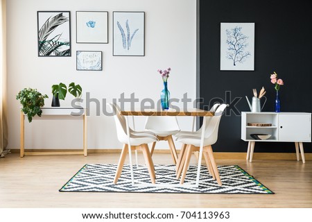 Modern dining room designed in scandi style Royalty-Free Stock Photo #704113963