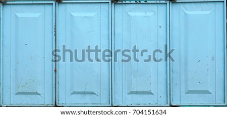 Beautiful steel windows painted light blue color