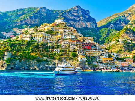 View of Positano village on a sunny day along Amalfi Coast in Italy. Royalty-Free Stock Photo #704180590