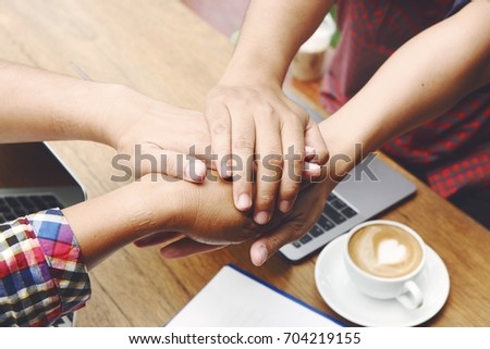 Close-up picture of sign hand that mean join together or business  success  ,business shaking hand