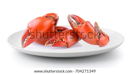 Boiled crab claws in a plate isolated on a white background