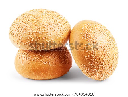 Burger bun with sesame seeds isolated on white background with clipping path