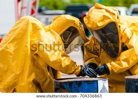 Firefighter training protect Chemical leak From the tank ,fireman Royalty-Free Stock Photo #704336863