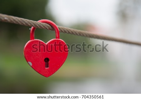 Red heart shaped padlock