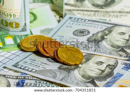 American dollars and euro banknotes. Coins. Money. Currency. Cash. Background with money.