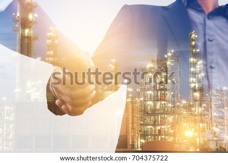 businessman handshake with Double exposure and city. business partner concept.