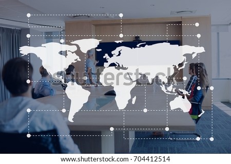 Digital composite of World map icon against office meeting background