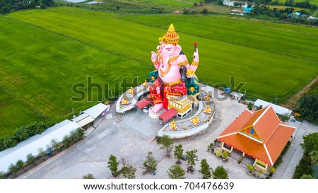 Om Ganesh Mantra Lord of Success  In the midst of green fields.