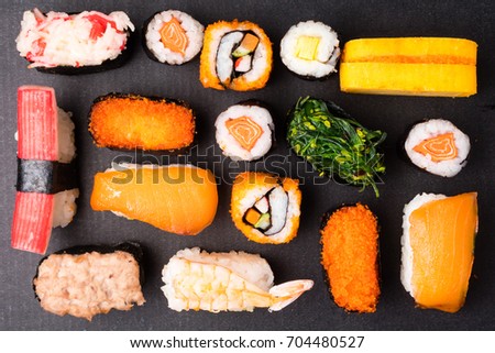 Top view of Sushi set on black background, Japanese food.