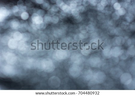 Silver and white bokeh lights defocused