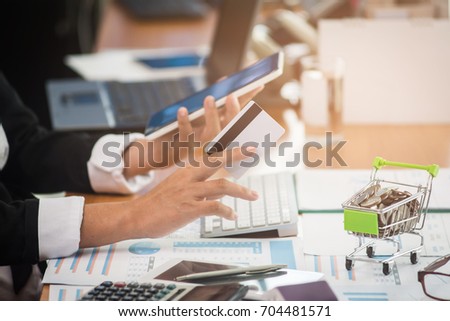 Business woman hands holding smart phone and using credit card for online shopping. Online shopping concept.