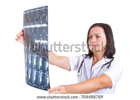 Portrait of Medical Woman Doctor Examining X-Ray Picture on a white background