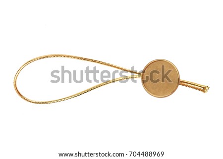 top view of empty golden metallic swing tag with gold fiber thread and copyspace isolated on white background