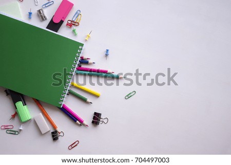 School supplies on white background with copy space