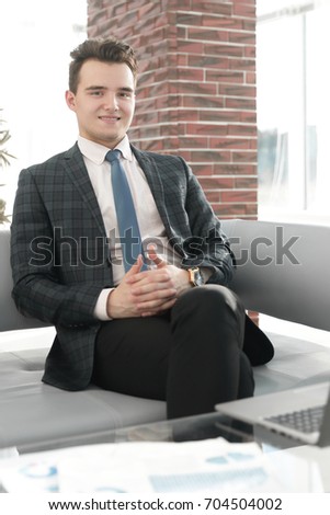 young businessman working with laptop at office