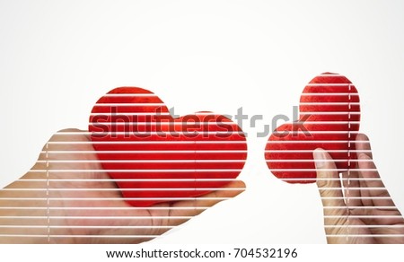 red hart,Valentine heart simbol.Red hart in hands.
