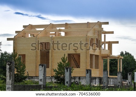 Photo of construction of houses from glued beams (laminated beam).