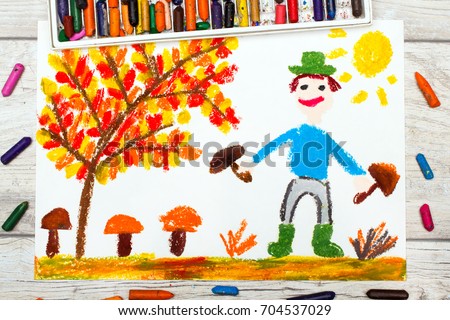 Photo of colorful drawing: Smiling man picking mushrooms in autumn forest
