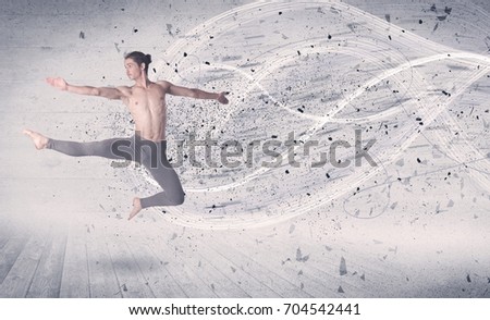 Performance ballet dancer jumping with energy explosion grungy particles concept on background