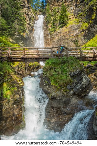 waterfall mountain landscape. Rabbi Valley, Trentino Alto Adige, northern Italy