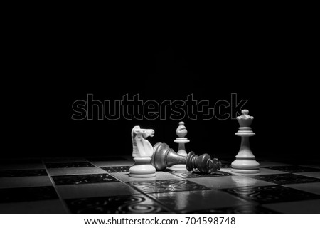 Chess photographed on a chess board Royalty-Free Stock Photo #704598748
