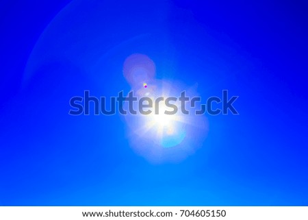 Blue sky large glowing star