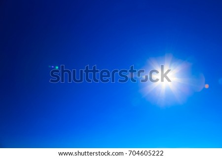 Blue sky large glowing star