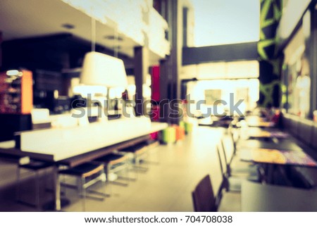 Abstract blur and bokeh coffee shop and restaurant interior for background - Vintage Filter