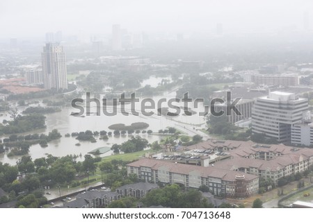 an aerial view of Houston showing the extent of flooding caused by Hurricane Harvey. Royalty-Free Stock Photo #704713648