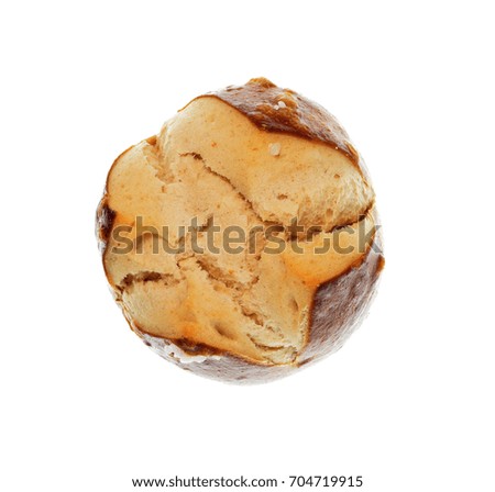 Top view close up photo of pretzel roll isolated on white background, cracked pattern on bread surface, abstract bakery texture