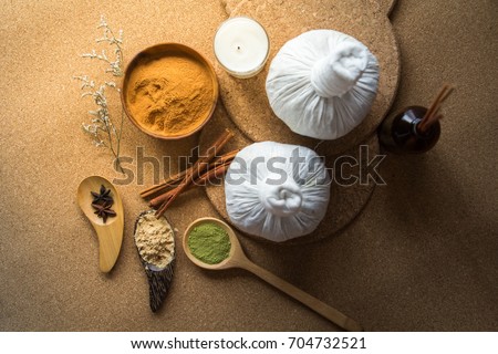 Thai herbs and spa massage, Nature medicine, Herbals ingredient such as cinnamon stick, turmeric, bergamot and dried mangosteen powder. Royalty-Free Stock Photo #704732521