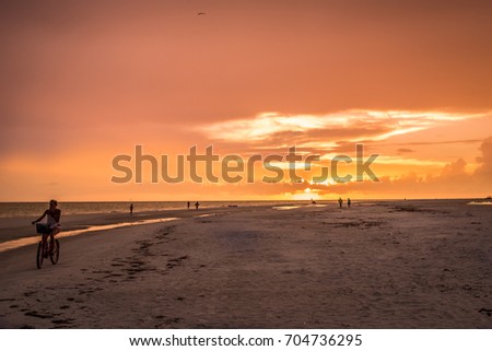 Sunset While Walking Down the Beach 