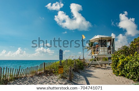 Lifeguard tower overlooking beach and tropical Atlantic Ocean in Hobe Sound Florida on Jupiter Island