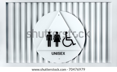 Unisex and handicapped sign on public restroom door