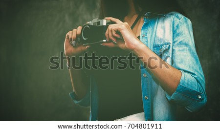  photographer girl  hold old Vintage camera lens  hipster Lifestyle  hobbies and leisure concept