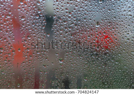 Window with water drops. Autumn rain.
