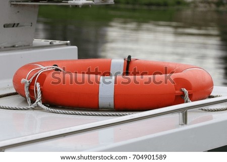 Orange Lifebuoy on the yacht