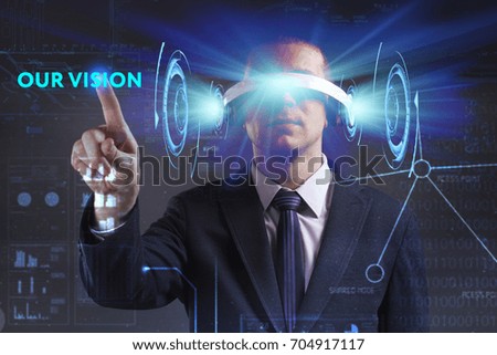 Business, Technology, Internet and network concept. Young businessman working in virtual reality glasses sees the inscription: Our vision