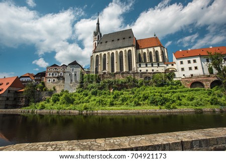 View on historical centre of Cesky Krumlov under amazing cloudy sky.  Bohemia .Czech republic .Europe. Unesco heritage.
