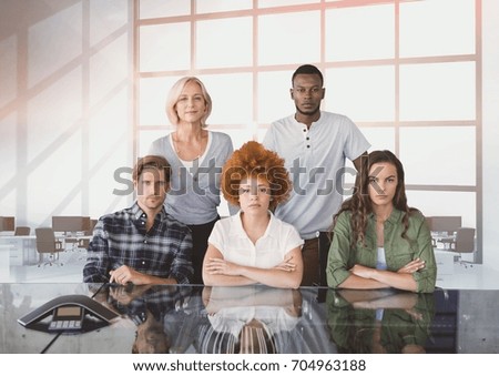 Digital composite of Business people at a desk looking  angry
