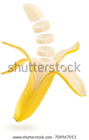 open and sliced banana floating isolated on white Royalty-Free Stock Photo #704967013