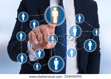 Businessman pointing contact on virtual screen for online communication