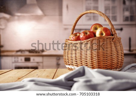 Pumpkin apples on wooden table in autumn kitchen