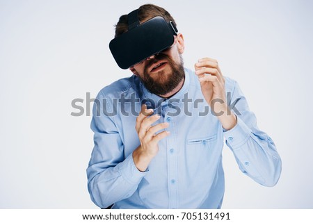 Man in 3d glasses on a light background                               