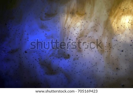 Bubbles, Watercolor paint dissolves in water, Colored abstractions, backlighting from different directions, large magnification