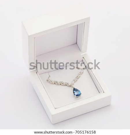 Luxury necklace in the white box Royalty-Free Stock Photo #705176158