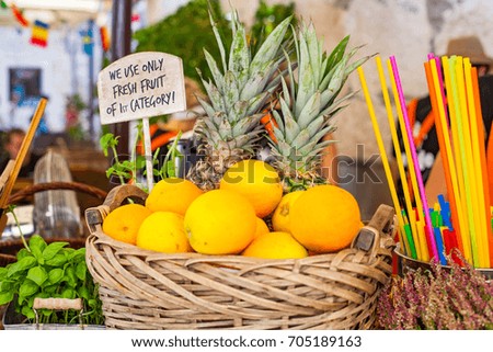 Picture of tasty fresh fruits in basket on a bar counter